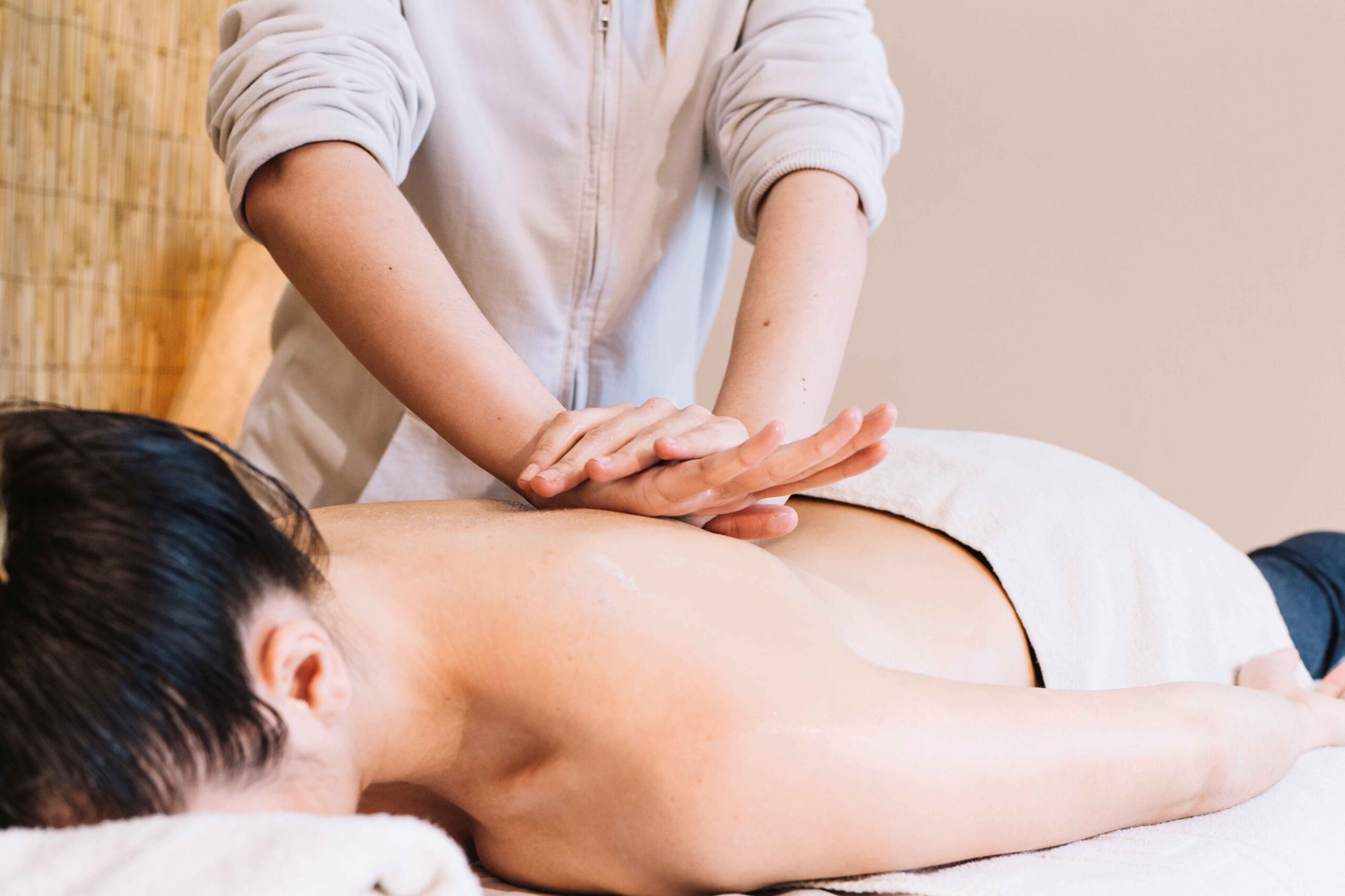 massage concept with womans back_11zon scaled